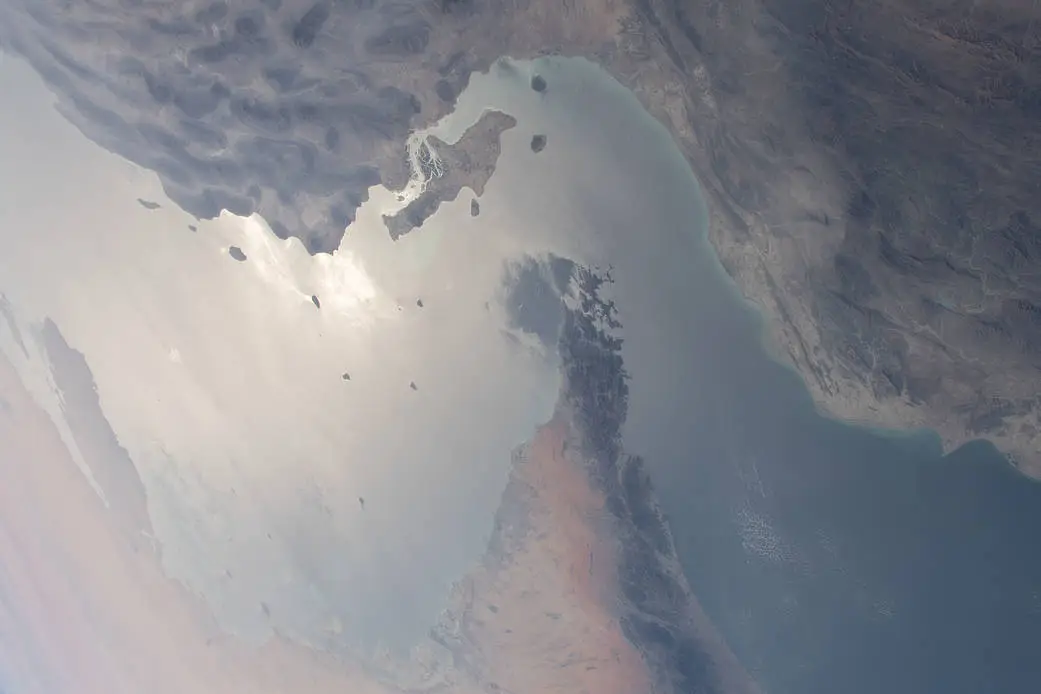 The strategically important shipping route of the Strait of Hormuz is pictured separating the nations of the United Arab Emirates and Iran. It also separates the main water bodies of the Persian Gulf and the Gulf of Oman.