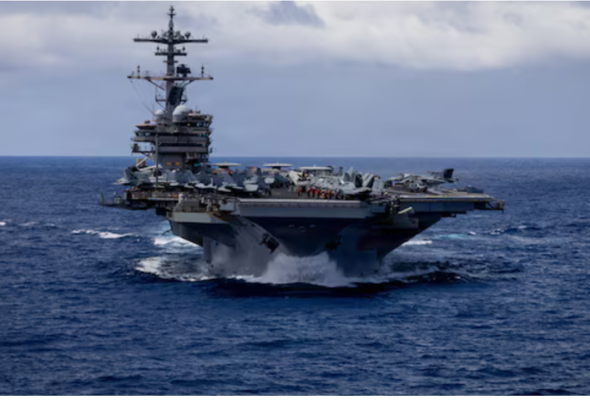 Nimitz-class aircraft carrier USS George H.W. Bush (CVN 77) sails in the Arabian Sea, May 3, 2026. George H.W. Bush is deployed to the U.S. 5th Fleet area of operations to support maritime security and stability in the Middle East. (U.S. Navy photo)