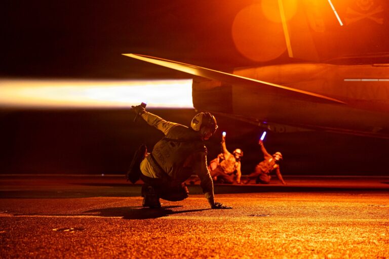 USS George H.W. Bush (CVN 77) Conducts Night Flight Operations U.S. Sailors conduct flight operations aboard Nimitz-class aircraft carrier USS George H.W. Bush (CVN 77), July 29, 2026. George H.W. Bush is deployed to the U.S. 5th Fleet area of operations to support maritime security and stability in the Middle East. (U.S. Navy photo)