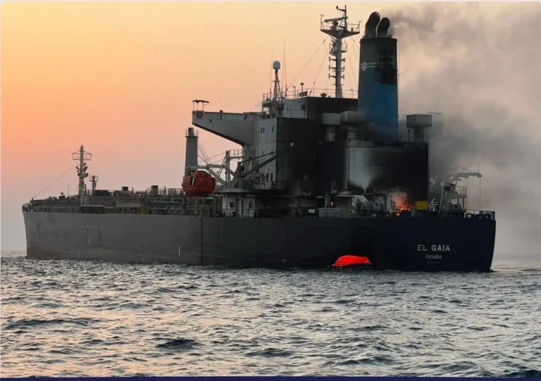 The tanker El Gaia sits off Oman with smoke and flames visible near the stern following an onboard fire. Photo: Oman Maritime Security Center. Oman Says ‘El Gaia’ Being Towed to Port; Two Crew Missing. Mike Schuler. Source: https://gcaptain.com/oman-says-el-gaia-being-towed-to-port-two-crew-missing/