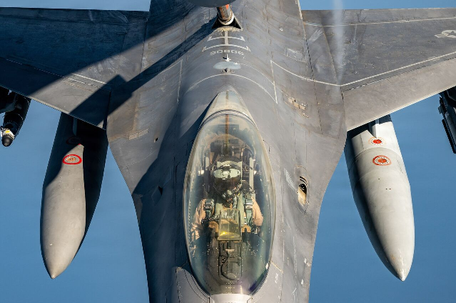A U.S. Air Force F-16 Fighting Falcon aircraft receives fuel from the boom of a U.S. Air Force KC-135 Stratotanker aircraft in the U.S. Central Command area of responsibility June 30, 2026. (U.S. Air Force photo by Tech Sgt Tiffany A. Emery) Source: https://www.centcom.mil/MEDIA/IMAGERY/igphoto/2003960568/